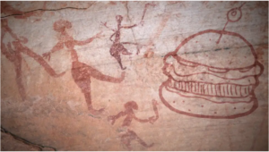 Mock cave painting with cave men hunting a hamburger on a bun.